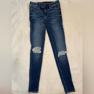 American eagle dark denim jeggings with knee holes.👖 Size 4 extra long.